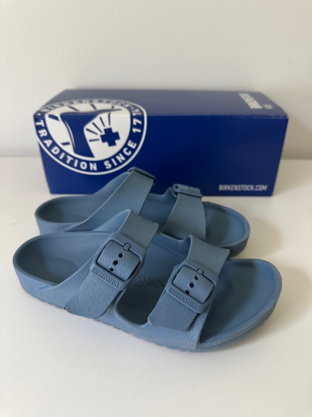 Kids Birkenstock Arizona EVA Sandals in Light Blue, size 3.